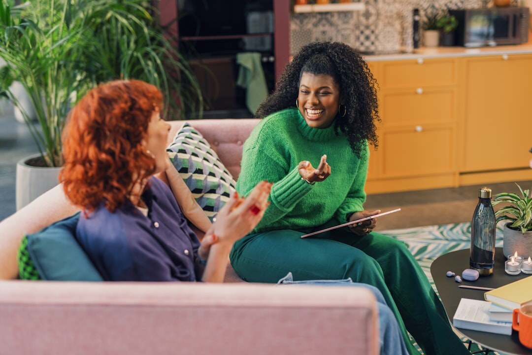 Young Danish woman being interviewed in her living room