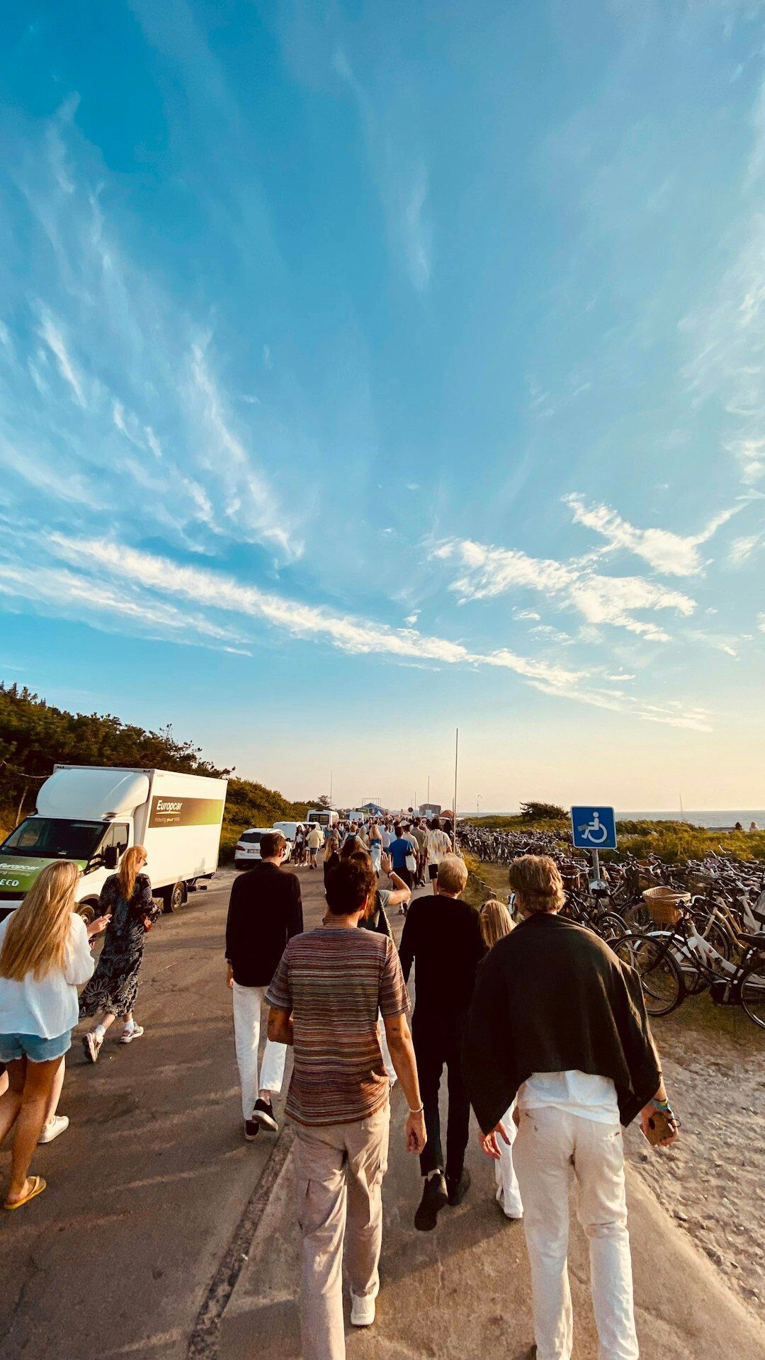 Team of Danish documentary photographers and journalists standing outdoors